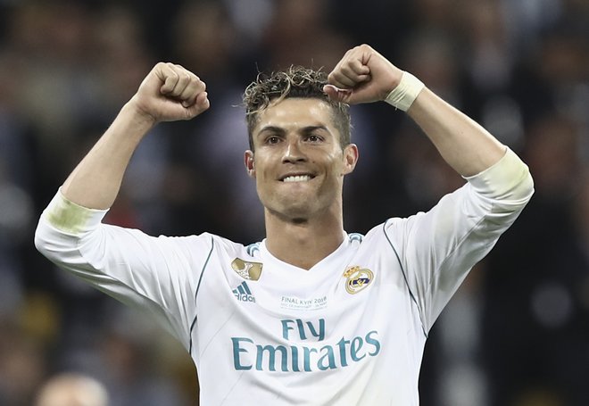 Cristiano Ronaldo je slekel Realov dres in bo oblekel Juventusovega. Foto Isabella Bonotto/AFP