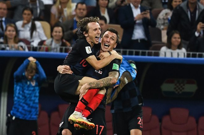 Spektakularna tekma, na koncu katere so se veselili Hrvati s kapetanom Luko Modrićem na čelu. FOTO: Manan Vatsyayana/AFP