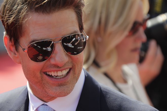 Ameriški igralec Tom Cruise se je v Parizu udeležil premiere njegovega zadnjega filma Mission: Impossible &ndash; Fallout. Foto Thomas Samson Afp