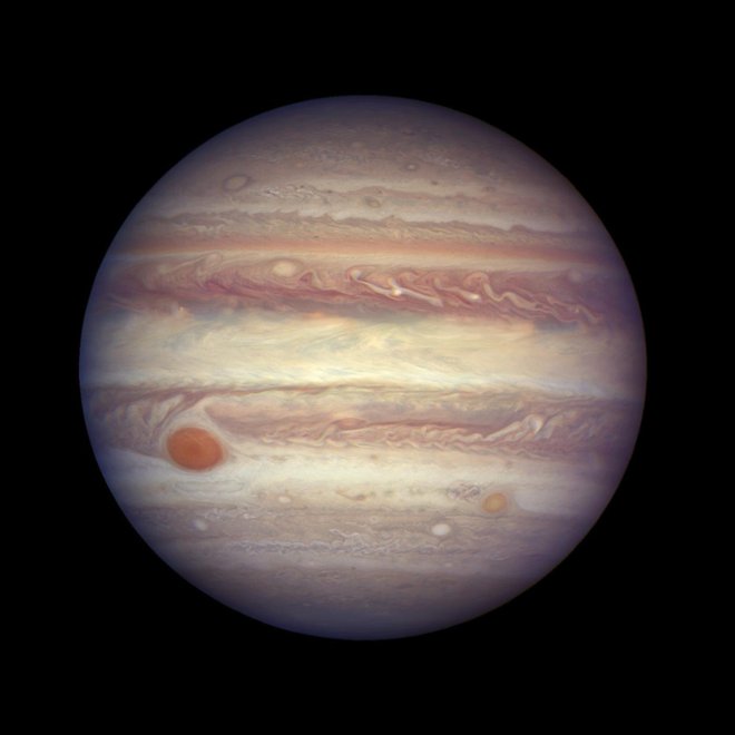 Jupiter ima kar 79 lun. FOTO: AP