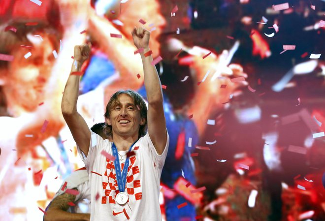 Hrvaška nogometna reprezentanca je z uvrstitvijo v finale SP tako navdušila enega od ljubiteljev nogometa v Peruju, da je svojega sina poimenoval Luka Modrić. FOTO: AP