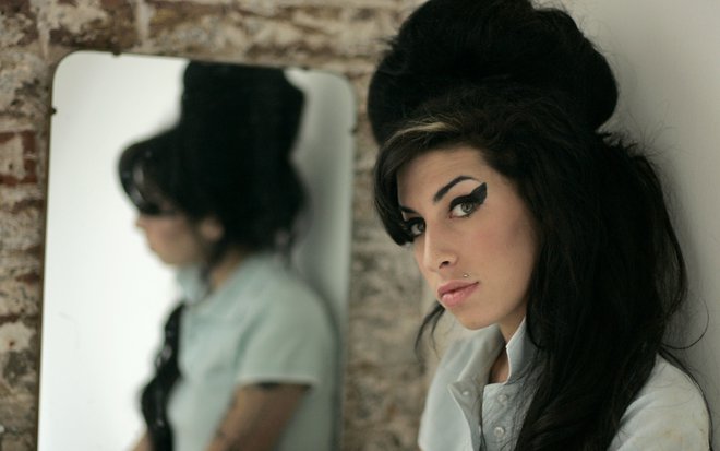 Amy Winehouse je umrla zaradi alkohola in drog. FOTO: Matt Dunham/Ap