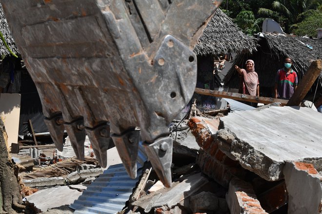 Indonezijo zdaj čaka naporna obnova. FOTO: AFP