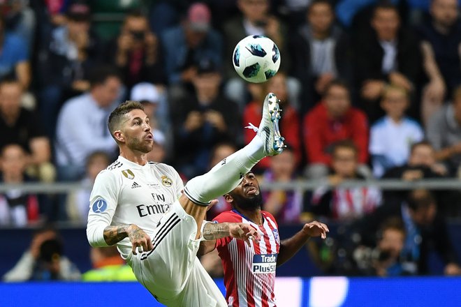 Sergio Ramos je Real povedel v vodstvo z enajstmetrovke. FOTO: AFP