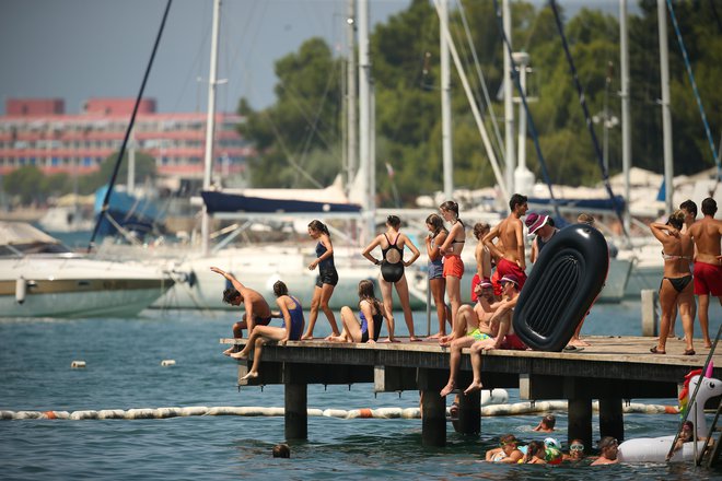 Otroci zaradi vse večjih socialno-ekonomskih razlik v okoljih, iz katerih prihajajo, počitnice preživljajo zelo neenakopravno. FOTO: Jure Eržen/Delo