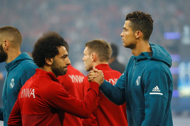 Mohamed Salah in Cristiano Ronaldo sta v ožjem izboru za nagrado Fife. FOTO: Reuters