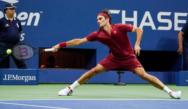 Roger Federer se šele drugič doslej ni prebil v newyorški četrtfinale. FOTO: Eduardo Munoz Alvarez/AFP
