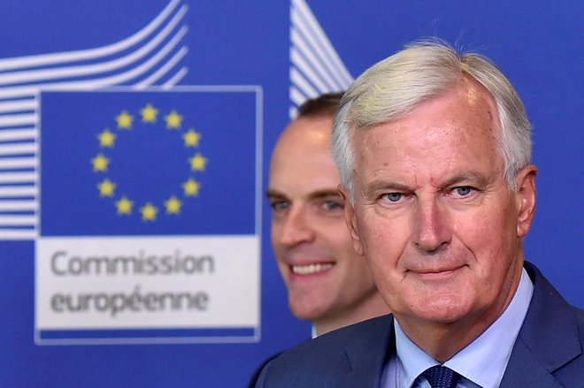 Srečanja glavnega pogajalca EU Michela Barniera in britanskega sekretarja za brexit Dominica Raaba vse pogostejša. FOTO: Eric Vidal/Reuters
