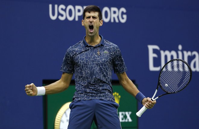 Novak Đoković se je razveselil druge zaporedne letošnje lovorike za grand slam.<br />
FOTO: AP