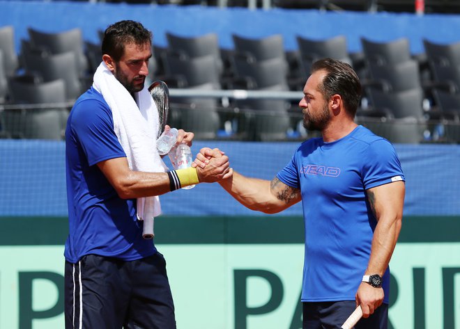 Prvi hrvaški lopar Marin Čilić in kapetan Željko Krajan, sicer tudi trener Polone Hercog, sta optimistična pred polfinalom.<br />
Foto Reuters