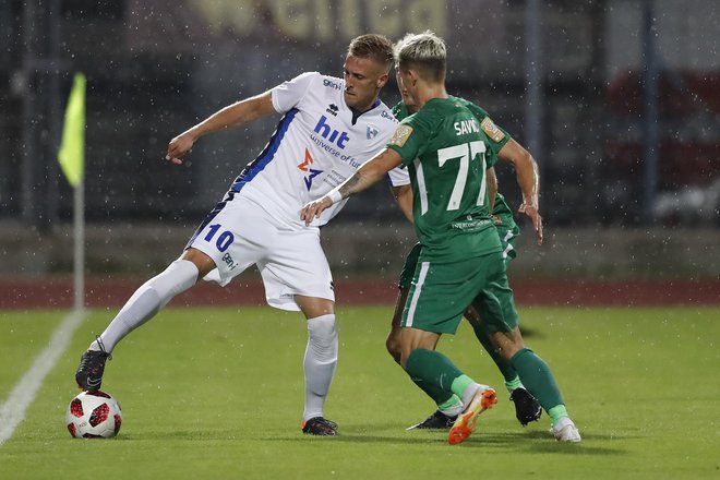 Andrej Kotnik (levo) se še ni ujel s SNL po neposrečeni avanturi v Italiji, je pa vseeno eden od najpomembnejših členov v goriškem moštvu. Foto Leon Vidic