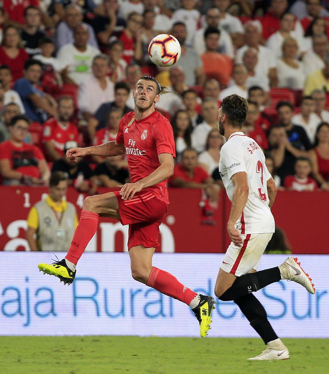Gareth Bale (levo) je bil nemočen v Sevilli proti Sergiju Gomezu.<br />
FOTO: AP