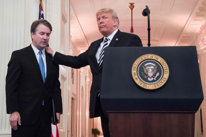 Donald Trump in Brett Kavanaugh FOTO: Jim Watson/AFP