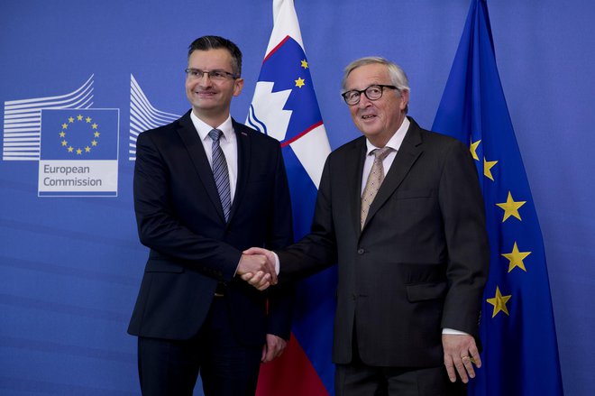Jean-Claude Juncker in Marjan Šarec. To&nbsp;je Šarčev prvi delovni obisk v tujini po prevzemu položaja. FOTO: Francisco Seco/AP