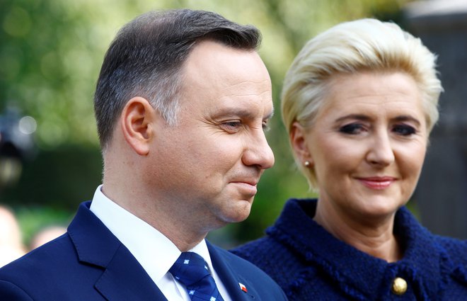 Poljski predsednik Andrzej Duda in žena Agata Kornhauser-Duda. FOTO: Arnd Wiegmann/Reuters