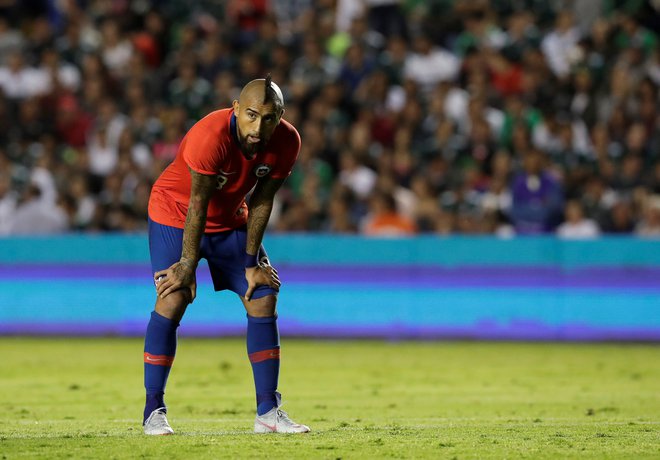 Arturo Vidal bo predlanski eksces drago plačal. FOTO: Henry Romero/Reuters