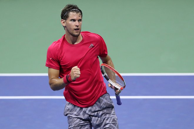 Dominic Thiem se je veselil uvrstitve v polfinale. FOTO: Matthew Stockman/AFP