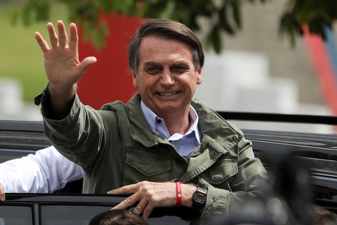 Bolsonarova kampanja je temeljla na obljubah o boju proti korupciji in visoki stopnji kriminala. FOTO: Pilar Olivares/Reuters