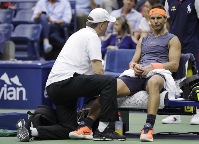 Za Rafaela Nadala je bil zadnji turnir v sezoni OP ZDA, kjer pa se je v polfinalu vdal zaradi poškodbe kolena. FOTO: AP