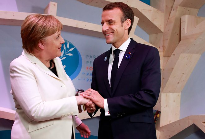 Angela Merkel in Emmanuel Macron sta pozvala k miru. FOTO: Gonzalo Fuentes/Afp