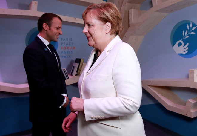 Nemška kanclerka Angela Merkel in francoski predsednik Emmanuel Macron. Foto: Gonzalo Fuentes/Reuters
