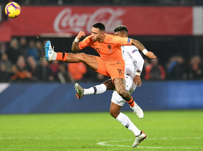 Memphis Depay še naprej zadeva kot za stavo. FOTO: Toussaint Kluiters/Reuters