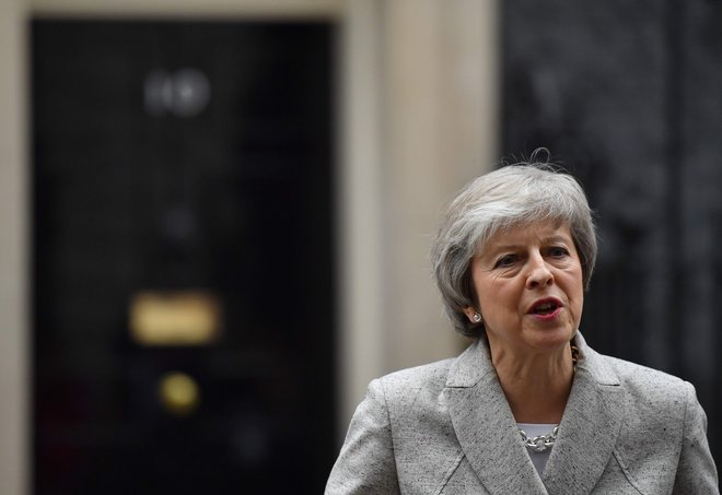 Theresa May vztraja, da sta osnutka ločitvenega dogovora in politične deklaracije dobra za Združeno kraljestvo in da bo storila vse, da ju bodo na nedeljskem vrhu potrdili tudi voditelji EU27. FOTO: Ben STANSALL / AFP