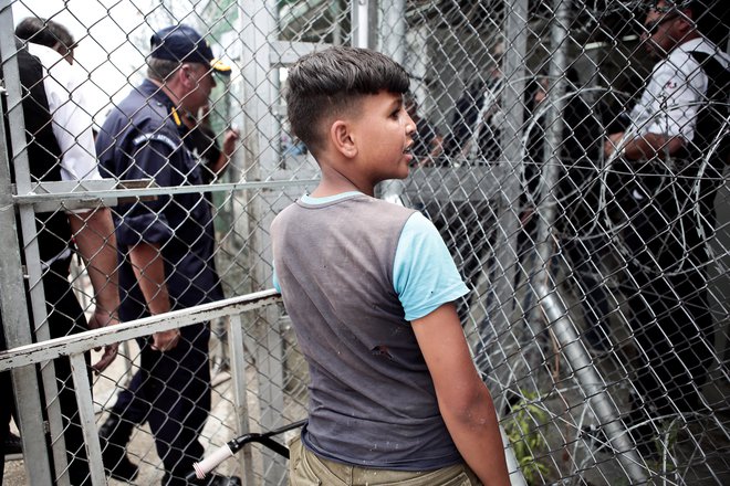 Po podatkih UNHCR je med begunci v Grčiji več kot 3600 otrok brez spremstva. FOTO: Reuters