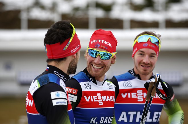 Jakov Fak, Klemen Bauer in Mitja Drinovec na uradnem treningu. FOTO: Matej Družnik/Delo