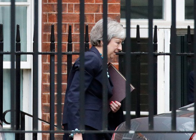 Britanska premierka Theresa May bo morda že danes odpotovala v Bruselj. FOTO: REUTERS/Phil Noble 