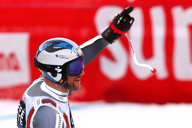 Aksel Lund Svindal je z dvignjeno roko pospremil svojo peto zmago v Val Gardeni, tretjo v superveleslalomu. FOTO: Alessandro Garofalo/Reuters