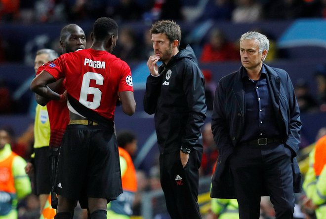 Romelu Lukaku in Paul Pogba sta bila med igralci, ki so si po odstavitvi Joseja Mourinha v vlogi trenerja zaželeli Michaela Carricka (v sredini). FOTO: Reuters