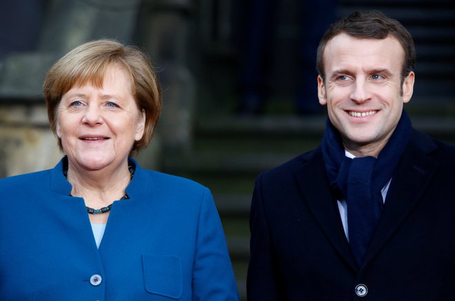 Angela Merkel in Emmanuel Macron sta dobre volje. FOTO: Reuters