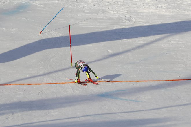 Mikaela Shiffrin je z izvrstnim smučanjem na drugi progi spisala zgodovino alpskega smučanja. FOTO: Reuters