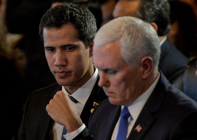 Juan Guaidó in Mike Pence. FOTO: AFP