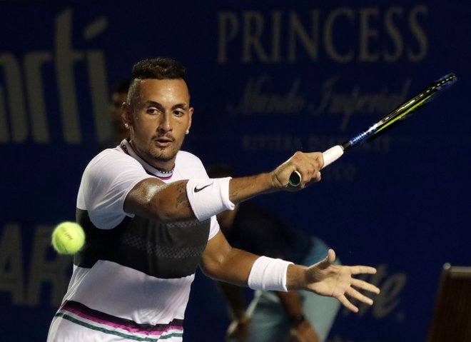 Nick Kyrgios je tokrat spregovoril na igrišču. FOTO: Henry Romero/Reuters