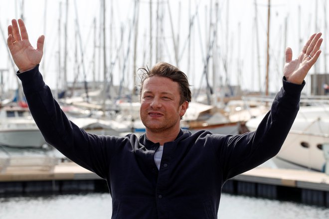 Jamie Oliver se kljub priljubljenosti ni uvrstil med 50 najboljših kuharjev sveta. Foto Reuters