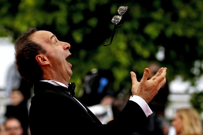 Benigni je nazadnje nastopil v filmu Rim z ljubeznijo. FOTO: Stephan Mahe/Reuters