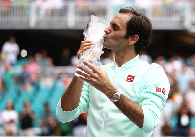 V Miamiju je Roger Federer lovoriko poljubil že četrtič. FOTO: Al Bello/AFP