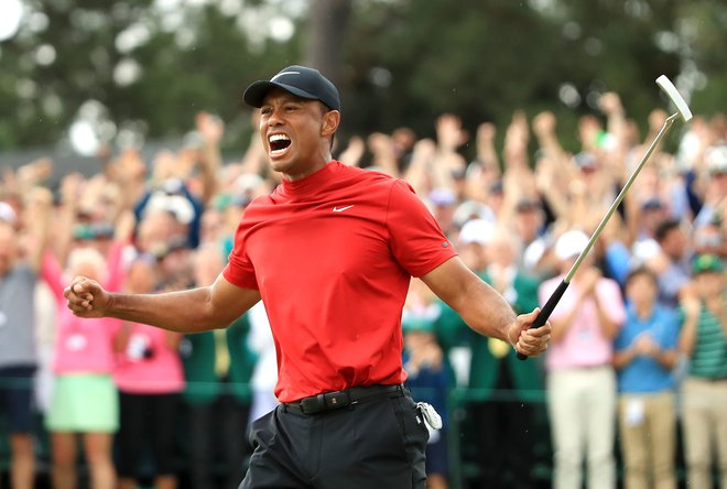 Takole se je osvojenega majorja po 11 letih veselil Tiger Woods. FOTO: AFP