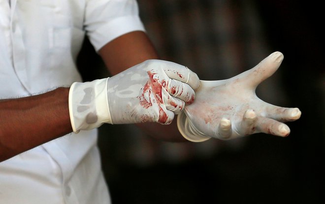 Napad na cerkve na Šrilanki je eden najhujših terorističnih napadov v zadnjih nekaj letih. FOTO: Dinuka Liyanawatte Reuters