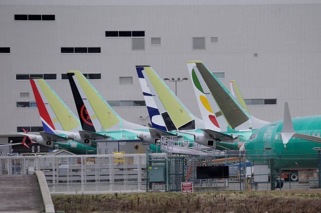 Na Boeingovem tovarniškem dvorišču se kopičijo nedostavljena letala 737 Max. Foto David Ryder Reuters