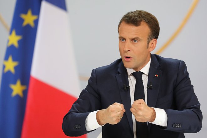 TOPSHOT - French President Emmanuel Macron gestures during his live address following the "Great National Debate", at the Elysee Palace in Paris on April 25, 2019. - President Emmanuel Macron on April 25, 2019 vowed to press ahead with his government's programme to transform France, adding public order must be restored after months of protests. (Photo by ludovic MARIN / AFP)