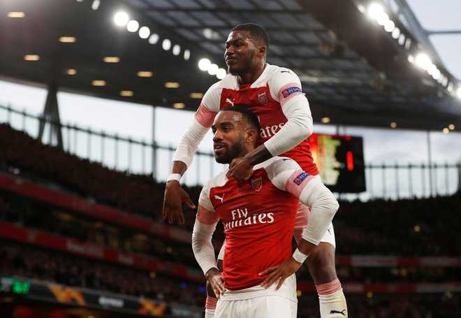Nogometašem Arsenala se je zaključek sezone v domačem prvenstvu ponesrečil, vtis so popravili v evropski ligi. FOTO: Reuters