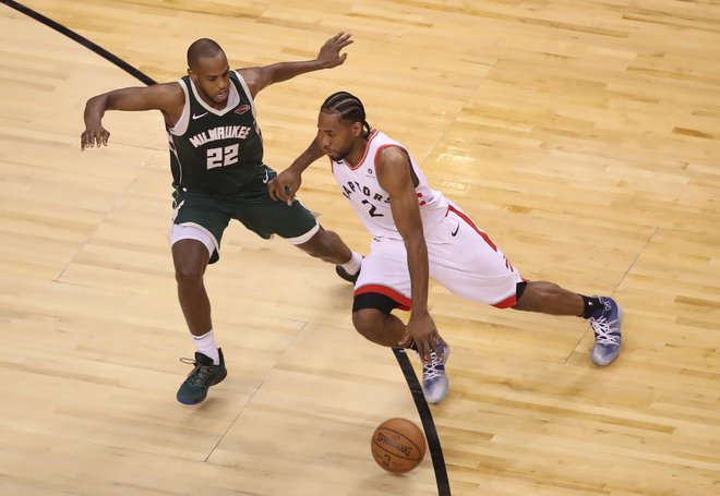 Kawhi Leonard je preigraval in priigral zmago Toronta. FOTO: Reuters