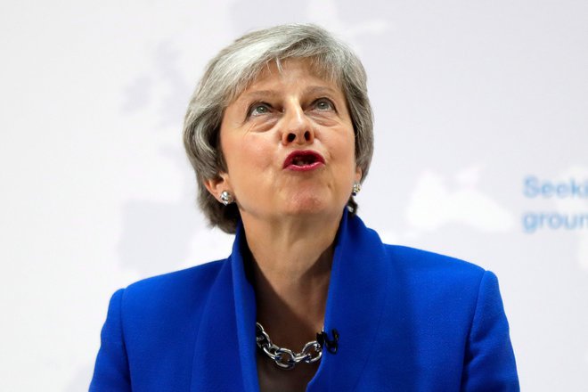 Theresa May FOTO: Kirsty Wigglesworth/AFP