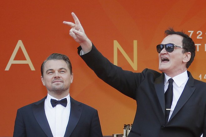 Režiser Quentin Tarantino in igralec Leonardo DiCaprio. FOTO: Eric Gaillard Reuters