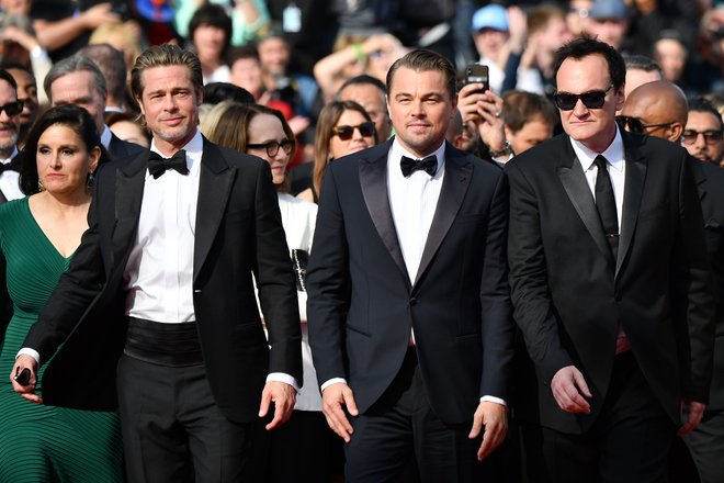 Brad Pitt, Leonardo DiCaprio in Quentin Tarantino. FOTO: AFP