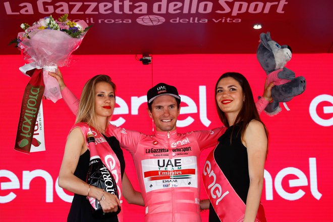 Jan Polanc ima v skupnem seštevku štiri minute naskoka pred Rogličem, zato si lahko obeta, da bo vsaj še v današnji etapi ostal v rožnatem.<br />
Foto AFP