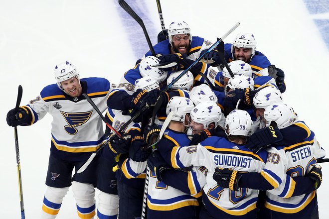 Hokejisti moštva St. Louis Blues so se veselili pomembne zmage v gosteh. FOTO: AFP